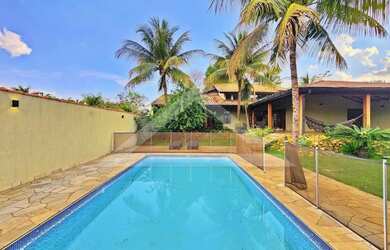 Imagem: A casa em condomínio possui 4 Dormitórios, 5 Banheiros, 5