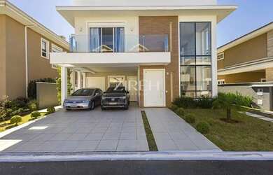 Imagem: A casa em condomínio possui 5 Dormitórios, 5 Banheiros, 4