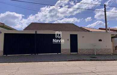 Imagem: A casa possui 3 Dormitórios, 2 Banheiros, 3 Vagas na garagem