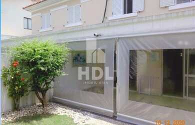 Imagem: A casa em condomínio possui 4 Dormitórios, 4 Banheiros, 4