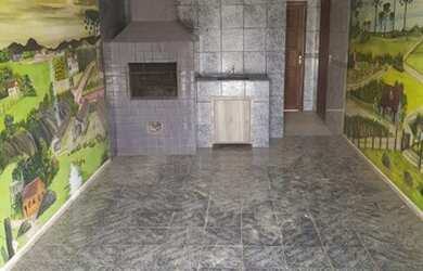 Imagem: A casa possui 2 Dormitórios, 2 Banheiros, 3 Vagas na garagem