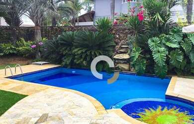 Imagem: A casa em condomínio possui 4 Dormitórios, 5 Banheiros, 5