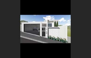 Imagem: A casa possui 3 Dormitórios, 3 Banheiros, 2 Vagas na garagem