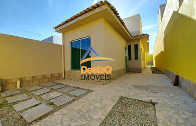 Imagem: A casa possui 3 Dormitórios, 2 Banheiros, 2 Vagas na garagem