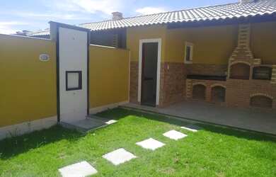 Imagem: A casa possui 3 Dormitórios, 3 Banheiros, 2 Vagas na garagem