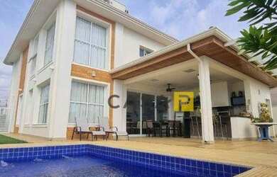 Imagem: A casa em condomínio possui 3 Dormitórios, 1 Banheiro, 4 Vagas