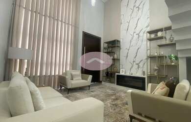 Imagem: A casa possui 4 Dormitórios, 5 Banheiros, 2 Vagas na garagem