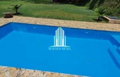 Imagem: A casa possui 3 Dormitórios, 5 Banheiros, 5 Vagas na garagem