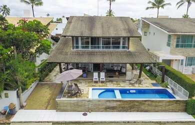 Imagem: A casa possui 5 Dormitórios, 5 Banheiros, 2 Vagas na garagem