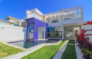 Imagem: A casa em condomínio possui 5 Dormitórios, 5 Banheiros, 4