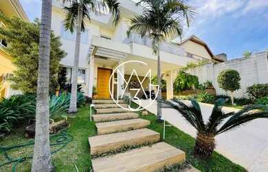 Imagem: A casa em condomínio possui 5 Dormitórios, 5 Banheiros, 4