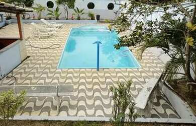 Imagem: A pousada chalé possui 3 Dormitórios e 5 Vagas na garagem