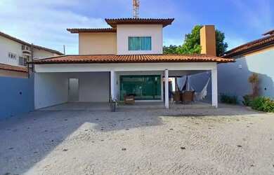 Imagem: A casa possui 3 Dormitórios, 5 Banheiros, 5 Vagas na garagem