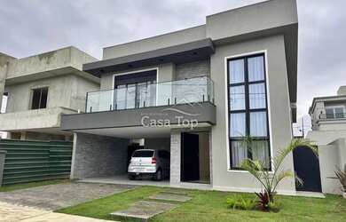 Imagem: A casa em condomínio possui 3 Dormitórios, 3 Banheiros, 2