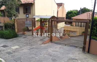 Imagem: A casa em condomínio possui 3 Dormitórios, 2 Banheiros, 1