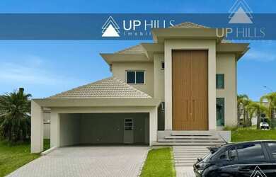 Imagem: A casa em condomínio possui 4 Dormitórios, 5 Banheiros, 2