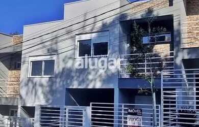 Imagem: A casa possui 2 Dormitórios, 3 Banheiros, 1 Vaga na garagem