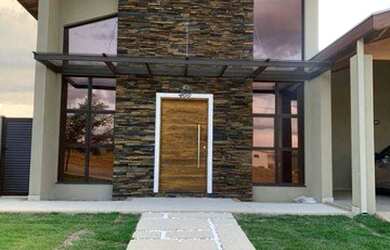 Imagem: A casa em condomínio possui 4 Dormitórios, 4 Banheiros, 2