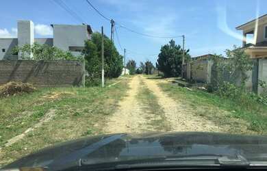 Imagem 1: Vendo terreno no condomínio alto da Pataca atrás do Balneário de Atafona