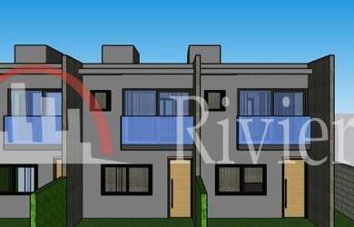 Imagem: A casa em condomínio possui 2 Dormitórios, 3 Banheiros, 2