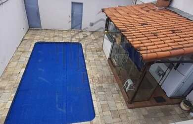 Imagem: A casa possui 3 Dormitórios, 5 Banheiros, 5 Vagas na garagem