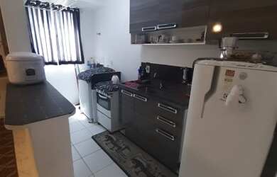 Imagem: O apartamento possui 2 Dormitórios, 1 Banheiro, 1 Vaga na garagem