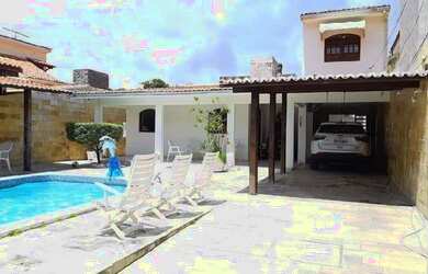 Imagem: A casa possui 4 Dormitórios, 4 Banheiros, 4 Vagas na garagem