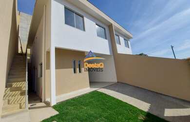 Imagem: A casa possui 3 Dormitórios, 2 Banheiros, 2 Vagas na garagem