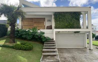 Imagem: A casa em condomínio possui 3 Dormitórios, 4 Banheiros, 2