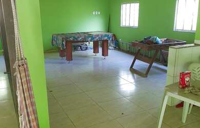 Imagem: A casa possui 2 Dormitórios, 3 Banheiros, 4 Vagas na garagem