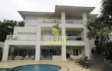 Imagem: A casa possui 5 Dormitórios, 5 Banheiros, 5 Vagas na garagem