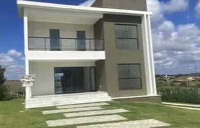 Imagem: A casa possui 4 Dormitórios, 1 Banheiro, 2 Vagas na garagem