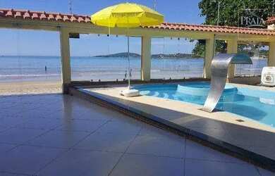 Imagem: A casa possui 4 Dormitórios, 3 Banheiros, 5 Vagas na garagem