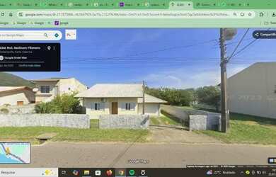 Imagem: A casa possui 2 Dormitórios, 2 Banheiros, 2 Vagas na garagem