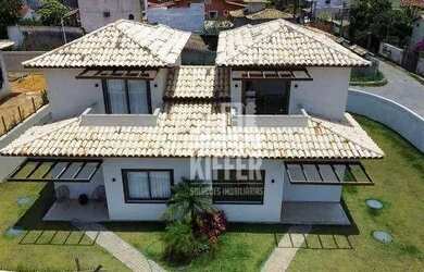 Imagem: A casa em condomínio possui 4 Dormitórios, 4 Banheiros, 2