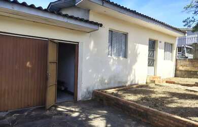 Imagem: A casa possui 1 Dormitório, 1 Banheiro, 2 Vagas na garagem