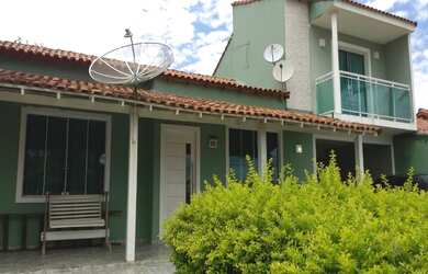 Imagem: A casa possui 5 Dormitórios, 3 Banheiros, 3 Vagas na garagem