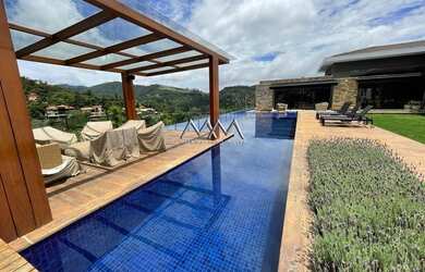 Imagem: A casa em condomínio possui 5 Dormitórios, 5 Banheiros, 5