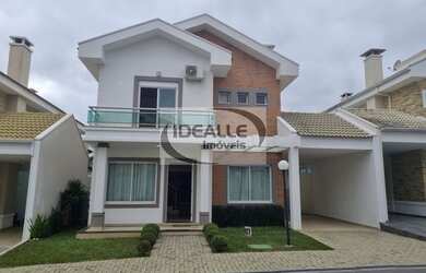 Imagem: A casa em condomínio possui 4 Dormitórios, 4 Banheiros, 3