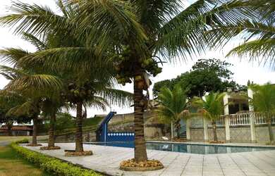 Imagem: A casa possui 3 Dormitórios, 1 Banheiro, 1 Vaga na garagem