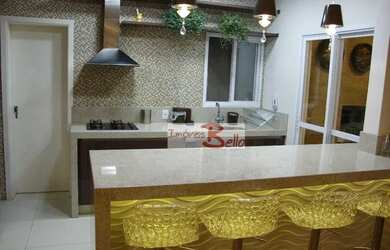 Imagem: O apartamento possui 3 Dormitórios, 5 Banheiros, 2 Vagas na