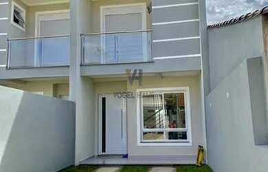 Imagem: A casa possui 2 Dormitórios, 3 Banheiros e 100m² de Área