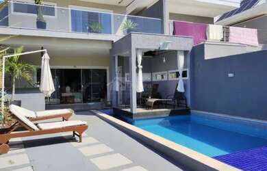 Imagem: A casa em condomínio possui 4 Dormitórios, 5 Banheiros, 380m²