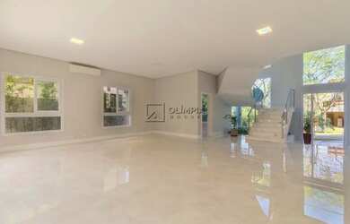 Imagem: A casa possui 4 Dormitórios, 5 Banheiros, 5 Vagas na garagem