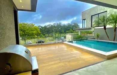 Imagem: A casa em condomínio possui 4 Dormitórios, 5 Banheiros, 5