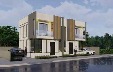 Imagem: A casa possui 2 Dormitórios, 3 Banheiros, 2 Vagas na garagem