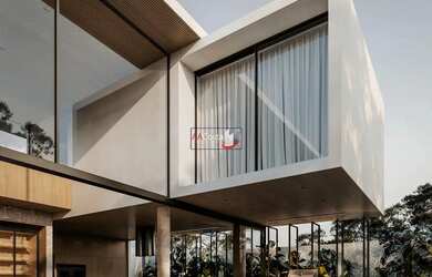 Imagem: A casa possui 3 Dormitórios, 4 Banheiros, 4 Vagas na garagem