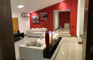 Imagem: A casa possui 3 Dormitórios, 3 Banheiros, 3 Vagas na garagem