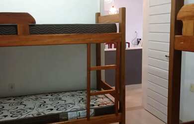 Imagem: A casa possui 3 Dormitórios, 2 Banheiros, 4 Vagas na garagem