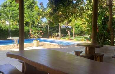 Imagem: A casa em condomínio possui 4 Dormitórios, 5 Banheiros, 3